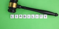 letters of the alphabet with the word liability. concept of liability.