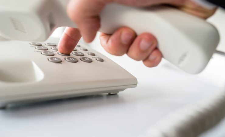 Closeup of businessman making a telephone call